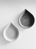Modern drop-shaped concrete incense cone dishes in black and white